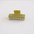 Detail of a large rectangular acetate hair claw clip with olive green and grey contrast - Grey Green Color Block