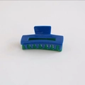 Detail view of double-sided checkerboard hair claw clip in blue and green colors - Blue and Green Patchwork