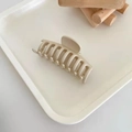 Minimalist creamy white matte hair claw clip on a tray for hair styling - Keel Style / Beige