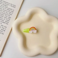 Flat lay of cute rainbow and white clouds hair clip on a cream petal ceramic tray - Apple Green-Rainbow