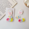Détail de barrettes mignonnes en acrylique avec lapin et donut aux couleurs macaron - Style Donut