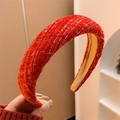 Close-up of red tweed headband with intricate weave and non-slip lining detail - White Silk Grid
