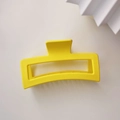 Top view of a 13cm matte yellow square hair claw clip on a minimalist white backdrop - Lemon Yellow (Square Claw Clip Approx 13cm)