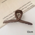Detail view of 13cm matte deep chocolate brown hair claw clip with cross-loop design - L / Matte Coffee