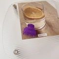 Close-up of a purple translucent matte hair claw clip with R-305 engraving on acrylic - R-305 / Jelly Purple