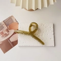 Close-up of olive green oversized hair claw clip on a minimalist white stone surface - L / Transparent Green