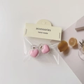 Detail of pink heart hair clips in handmade packaging with aesthetic lemon props - Light Pink Heart Jaw Clip