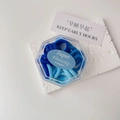 Close-up of blue high elasticity towel hair ties set in a clear hexagonal storage box - Boxed (20 Pieces) / Blue