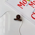 Close-up of a small tortoise shell acetate hair claw clip with France Handmade text - Deep Mint Blue Brown Marble