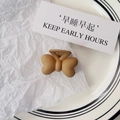 Detailed macro view of matte brown butterfly hair claw clip on decorative plate - Bowknot Style / Matte Milk Tea Butterfly