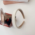 Close-up of off-white woven sponge headband with elegant vintage texture for women - Grid Headband-White