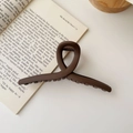 Macro detail of the 15cm matte coffee brown hair claw clip with a sleek twisted design - Matte Cross Style / Extra Large / Matte Coffee