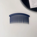 Détail du peigne latéral bleu marine à 23 dents avec une finition mate antidérapante - Bleu Marine