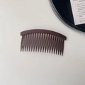 Detail view of dark brown matte hair comb with dense teeth for fixing loose hair - Plain Hair Comb - Coffee