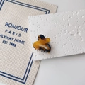 Detail of mini amber tortoiseshell hair claw clip with vintage acetate texture - Dark Leopard Print