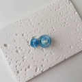 Macro view of blue marble-patterned resin hair clip with dual disk geometric design - Single Piece / Small / Blue