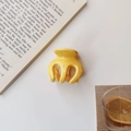Detail of bright yellow pumpkin hair claw clip on a stylish lifestyle background - Bright Yellow Glossy / Yellow