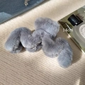 Detail view of 14cm large plush hair claw clip in grey with soft faux fur texture - M-Shape Hair Claw / Haze Blue