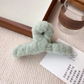 Close-up of soft mint green plush hair claw clip on cozy beige striped fabric - Large Size 14CM / Mint Green