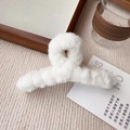 Detail of white plush faux fur hair claw clip in a warm aesthetic lifestyle setting - Large Size 14CM / White