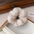 Close-up of beige plush faux mink hair scrunchie in a vintage wooden jewelry box - Small - Greyish White