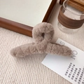 Close-up of soft plush hair claw clip in brown on aesthetic fabric background - Large Coffee