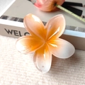 Elegant white and yellow gradient plumeria flower hair claw clip with resin finish - Orange and White