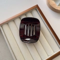 Detail view of large dark burgundy resin hair claw clip with square hollow design - Small / Dark Coffee