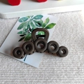 Matte dark brown five-ring interconnected claw clip on an aesthetic white card - Five-Circle Hollow Style / Brown