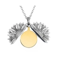 Detail of opening silver sunflower locket necklace with internal polished gold round disc - Silver (Gold Plate)