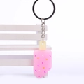 Detailed view of a pink silicone ice cream keychain with colorful sprinkles on a mini bench - 3CM+5CM / Light Pink
