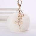 Porte-clés pompon en fausse fourrure blanche avec pendentif ballerine dorée et strass - Pompon de 8 cm / Blanc Cassé