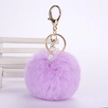 Detail of purple fluffy keychain with gold lobster clasp and crystal-encrusted bead decoration - 8cm Pompom / Taro Purple