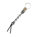Close-up of leopard print wood beads and MAMA letter beads on keychain wristlet - White Leopard