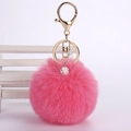 Detail of pink faux rabbit fur keychain with sparkling rhinestone ball and gold clasp - 8cm Pompom / Watermelon red