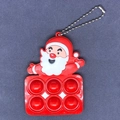 Dettaglio del portachiavi giocattolo Babbo Natale Pop It in silicone con catena a sfere - Babbo Natale