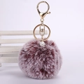 Detailed view of dusty pink faux rabbit fur pompom keychain with sparkling crystal bead - 8cm Pompom / Two-tone Wine Red