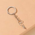 Mini silver alloy plier tool keychain pendant with a polished metal ring and chain - Long Nose Pliers Style / Silver