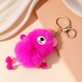 Dettaglio dell'orso di peluche rosa con chiusura in metallo dorato e pompon in finta pelliccia - Rosa Rosso