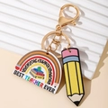 Rainbow teacher appreciation keychain with pencil charm and 'Best Teacher Ever' text - Green Apple Rainbow Wood Plaque + Pencil