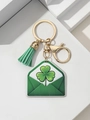 Detail of St. Patrick's gold keychain with green tassel and clover lucky envelope charm - Envelope Style (5)