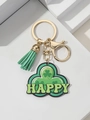 Detail of St. Patrick's Day clover keychain with green tassel and Happy lettering - Happy Shamrock Style (9)