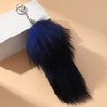 Portachiavi a coda di volpe sintetica blu scuro e nero con moschettone in metallo - Blu