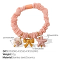Pink scrunchie bracelet with gold bow, floral ceramic bead and pink starfish charms - Pink - Floral Starfish Style (FQ01OE-PJ783DRG-PJ259G-PJPJ355PKG)