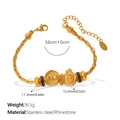 Pulsera de cuentas de acero dorado con lazo, amuleto sonriente y cristales negros - SL446G1 Pulsera Multi-elementos (Estilo Sonrisa Lazo)