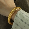 12mm vintage style golden titanium steel tubogas stretch bracelet worn on wrist - SZ12 Gold Width 1.2cm (Diameter 6cm)