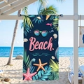 Detail of microfiber beach towel featuring blue background with starfish and palm leaf design - Deep Blue Beach Lettering / 70x150cm