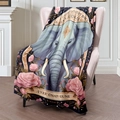 French elephant flannel blanket with pink roses on deep blue background draped over a chair - 100x150cm