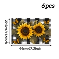 Macro view of 6-piece buffalo plaid placemats with sunflower and butterfly prints - Sunflower Butterfly Style