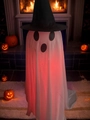 Close-up of a glowing Halloween ghost with a black wizard hat and soft red LED lighting - White Red Light (YL-02)